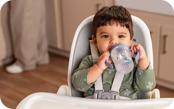 Toddler drinking from cup