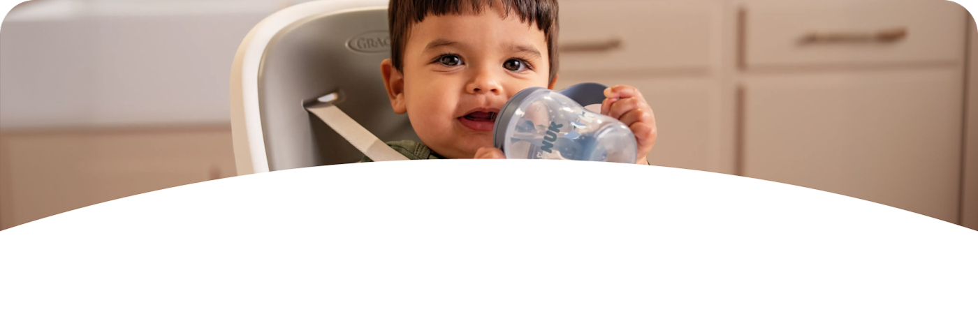 [Translate to English (Australia) (Reborn) nuk.com.au:] Baby with Learner Bottle Straw