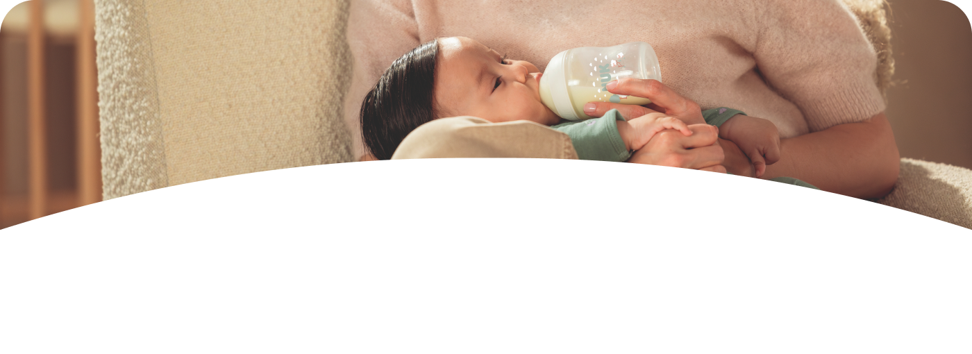 [Translate to English (Australia) (Reborn) nuk.com.au:] Mother with Baby and Baby bottle