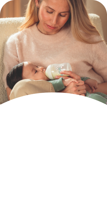 [Translate to English (Australia) (Reborn) nuk.com.au:] Mother with Baby and Baby bottle