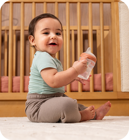 [Translate to English (Australia) (Reborn) nuk.com.au:] Baby with Learner bottle