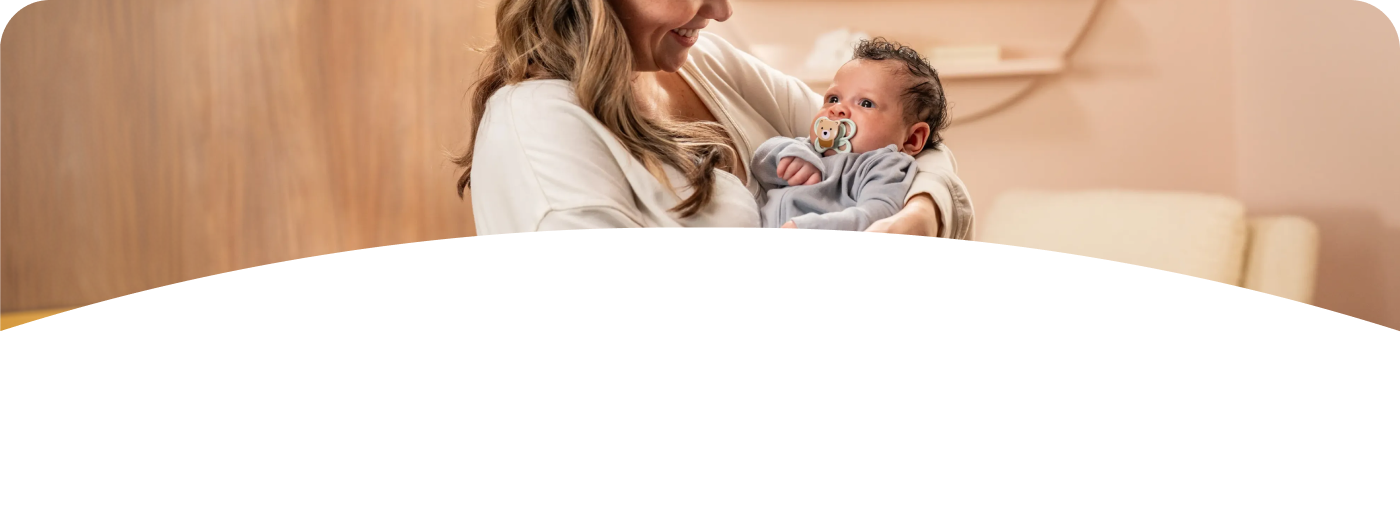 [Translate to English (Australia) (Reborn) nuk.com.au:] Mother with baby and soother