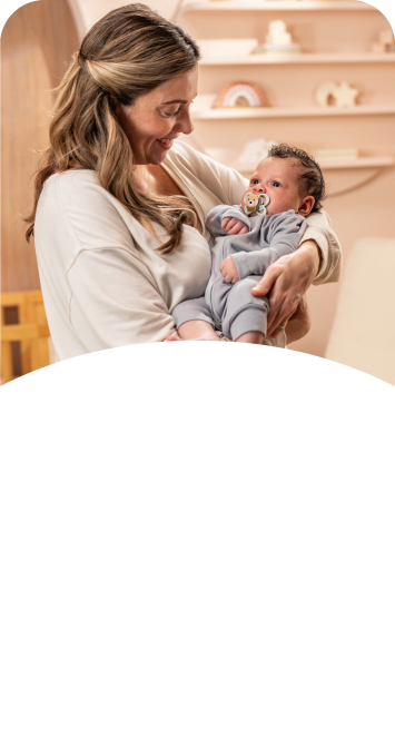 [Translate to English (Australia) (Reborn) nuk.com.au:] Mother with baby and soother
