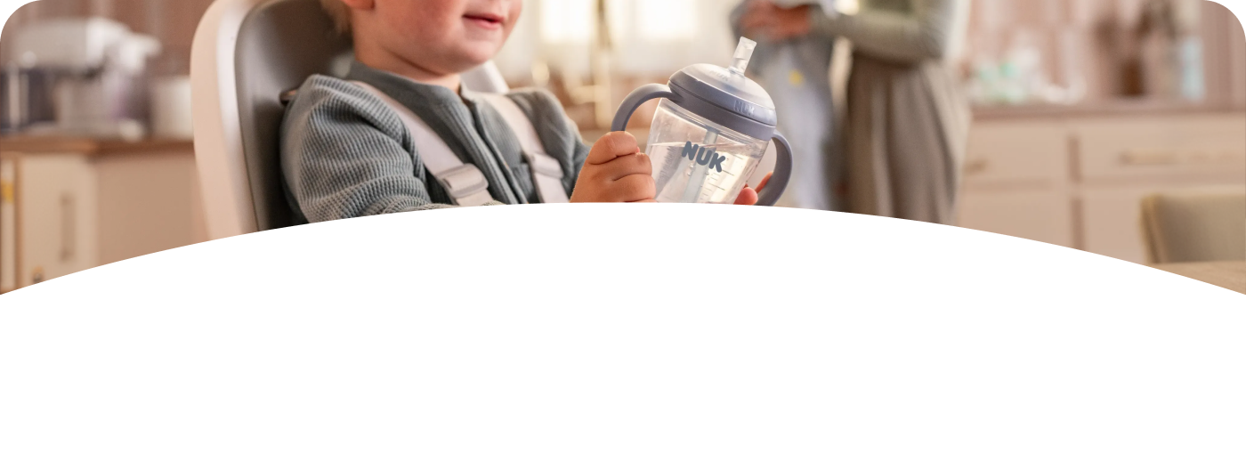[Translate to English (Australia) (Reborn) nuk.com.au:] Baby with Learner Bottle Straw