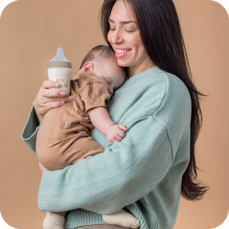 [Translate to English (Australia) (Reborn) nuk.com.au:] Mother with Baby and Babybottle