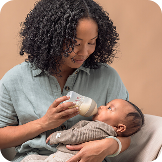 [Translate to English (Australia) (Reborn) nuk.com.au:] Mother with Baby and Baby bottle