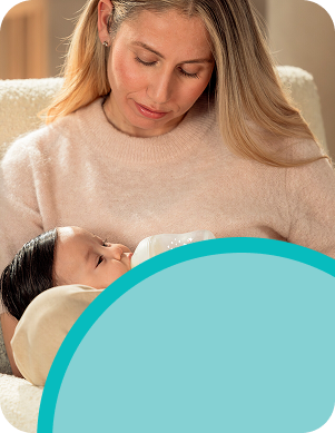 Mother with baby and babybottle