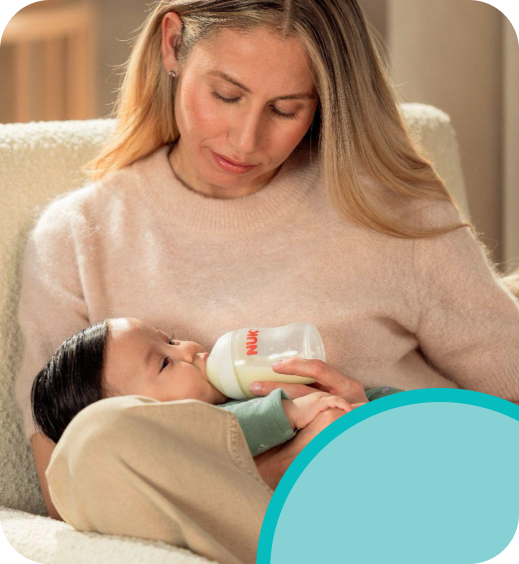 [Translate to English (Australia) (Reborn) nuk.com.au:] Mother with Baby and Babybottle
