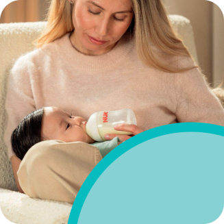 [Translate to English (Australia) (Reborn) nuk.com.au:] Mother with Baby and Babybottle