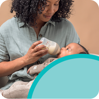 [Translate to English (Australia) (Reborn) nuk.com.au:] Mother with Baby and Babybottle