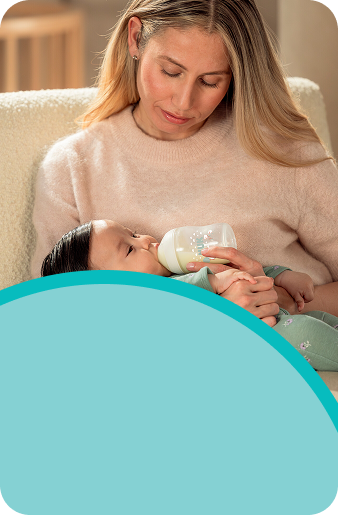 [Translate to English (Australia) (Reborn) nuk.com.au:] Mother with Baby and baby bottle